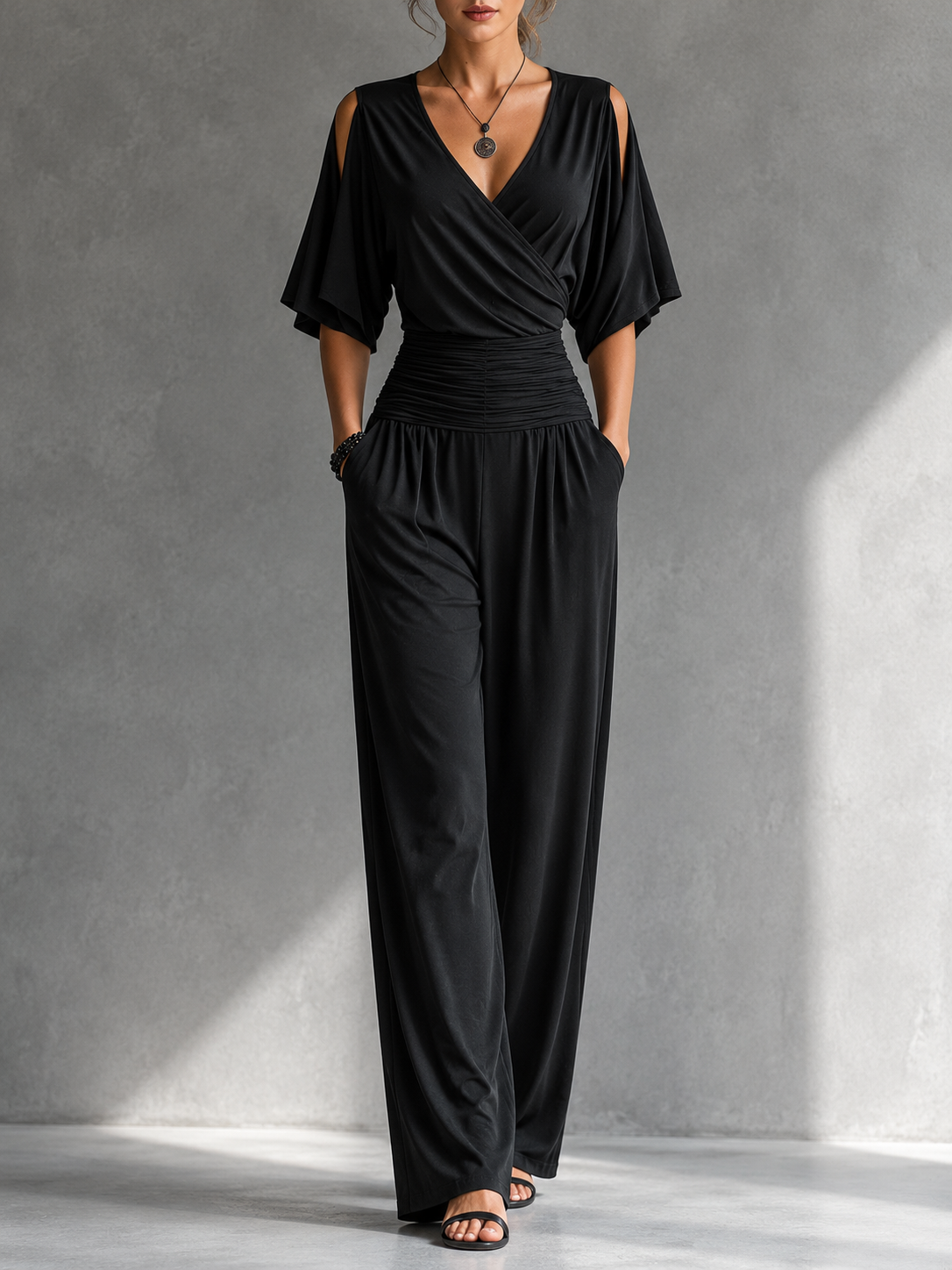 Conjunto elegante con efecto cruzado y pantalón de pierna ancha