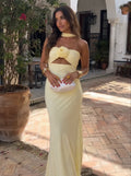Vestido largo con adorno de rosa